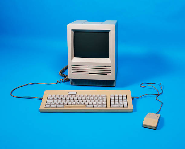 Old Computer Shot of an old 1986 Personal Computer. mainframe stock pictures, royalty-free photos & images