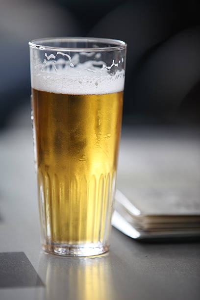 istock Glass of refreshing beer on table 182852573