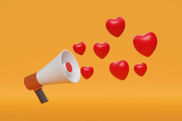 istock Megaphone with red hearts isolated on orange background. 3d illustration. 1828528372