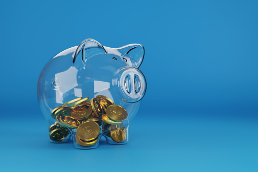 Glass piggy bank with coins inside. 3d illustration.