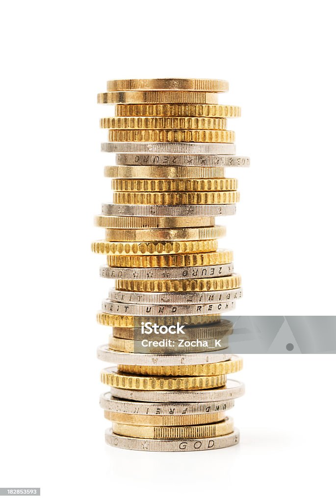 Stack of gold and silver coins piled together Stack of coins isolated on white.Find more in Coin Stock Photo