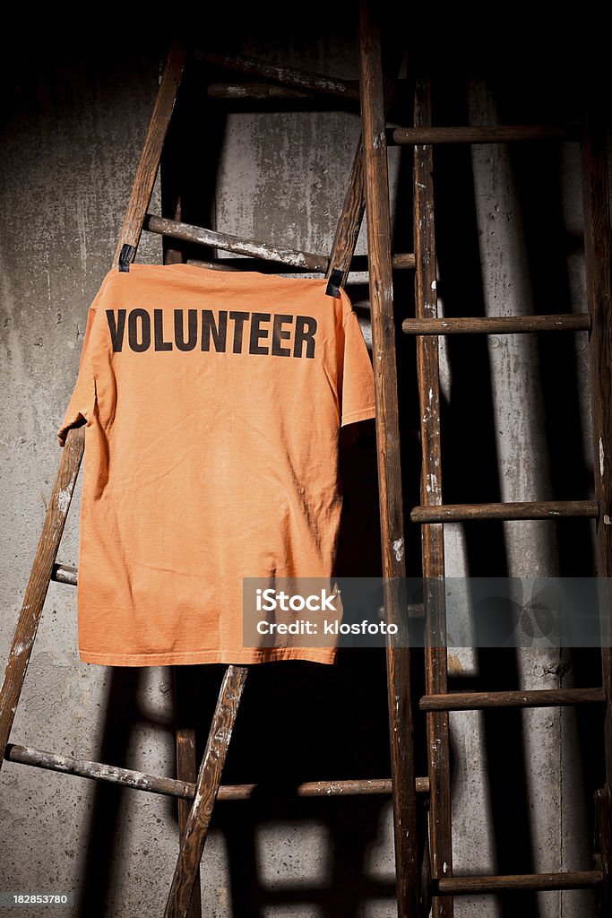 Conceito de voluntários - Foto de stock de Camiseta royalty-free