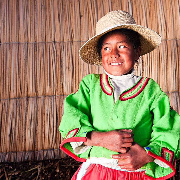 istock Little girl on Uros floating island 182855488