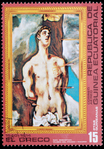 Republic of Equatorial Guinea cancelled postage stamp featuring an El Greco painting from the 1500's showing the martyrdom of St. Sabastian.  St. Sebastian was one of the early martyrs of the Christian religion and is commonly depicted tied to a tree and shot with arrows.