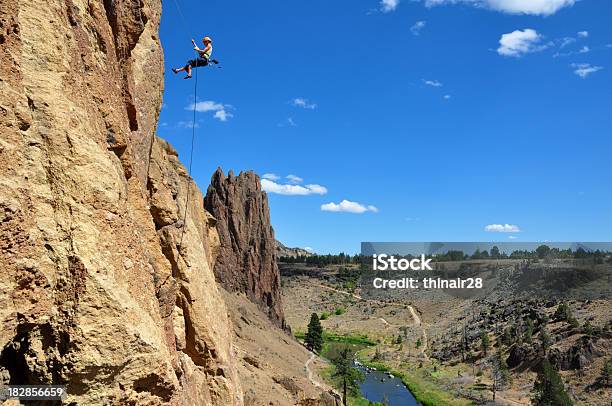 Rock Climber Rappelling Stock Photo - Download Image Now - Smith Rock State Park, Oregon - US State, Smith Rock