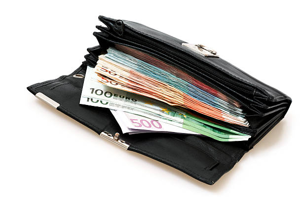 Wallet full of European Union currency banknotes.