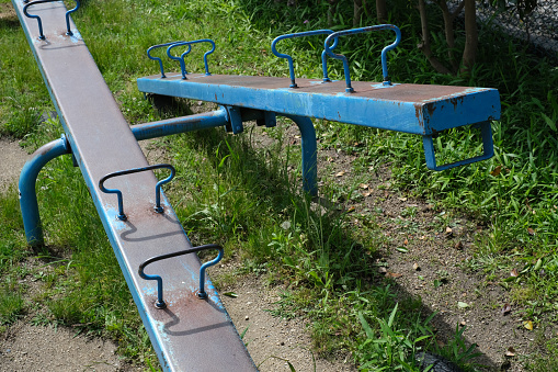 Blue seesaw in the park