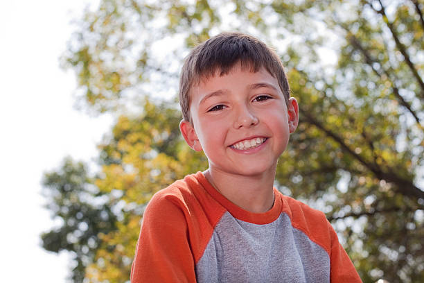 istock Happy young boy at the park 182857142