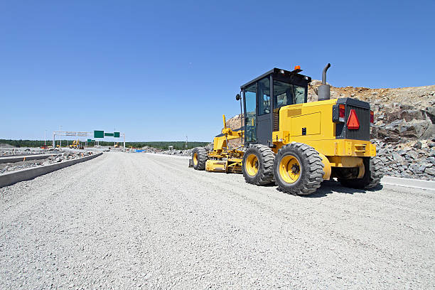 construcción de carretera - construction machinery machine industrial equipment grader fotografías e imágenes de stock