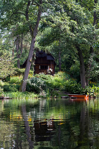 istock Holiday small cottage at the river 182859807