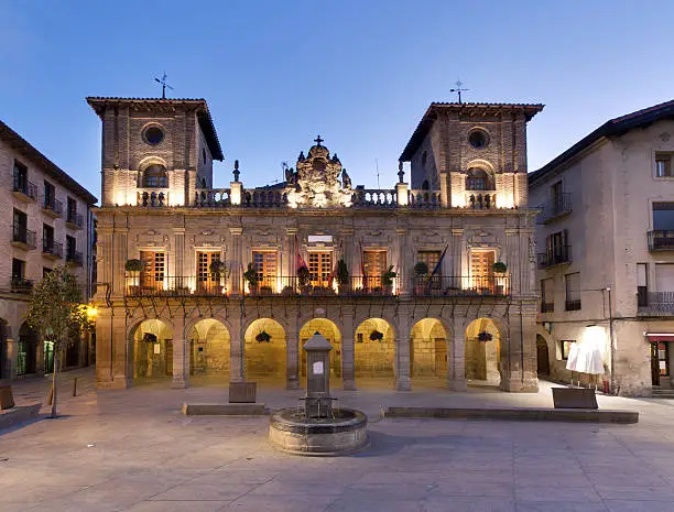 "Old building of Viana ( Town hall ) ( Navarre, Spain ) at sunset."