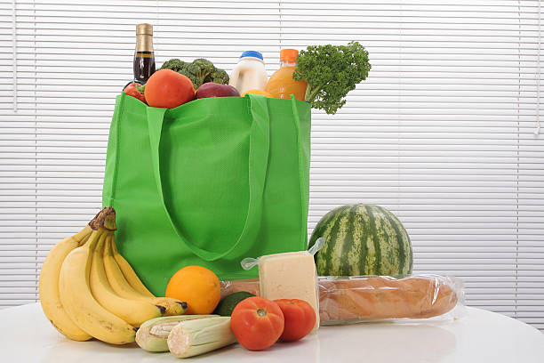 식료품 - shopping bag orange bag handle 뉴스 사진 이미지