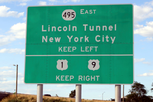 Big Green Sign giving directions into New York City via the Lincoln Tunnel.