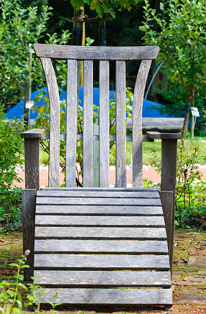 istock Wooden chair in garden 182861191