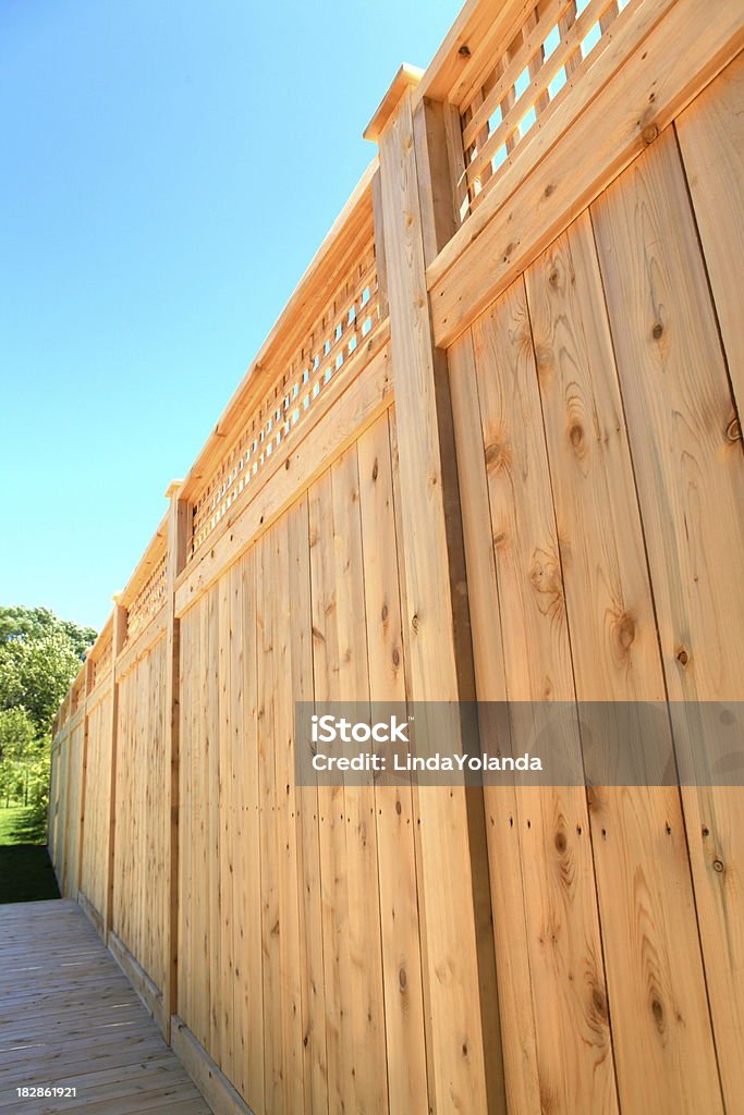 Wooden Cedar Fence A wooden fence made of cedar. Fence Stock Photo