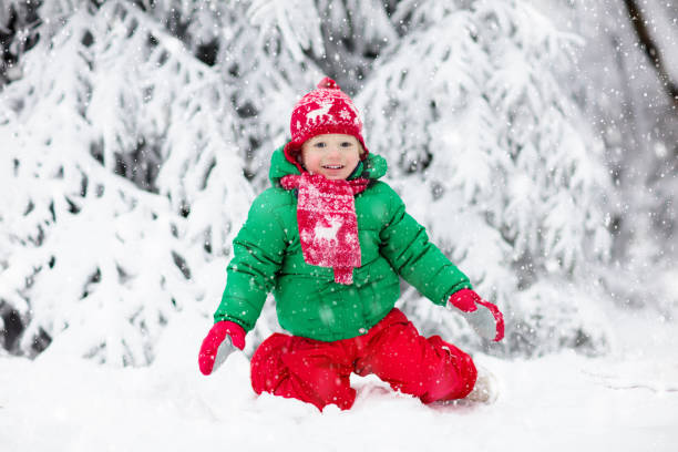 istock Boy on sleigh ride. Child sledding. Kid with sledge 1828623283