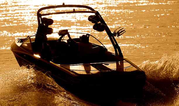 wakeboardboat - wakeboarding waterskiing water ski sunset ストックフォトと画像