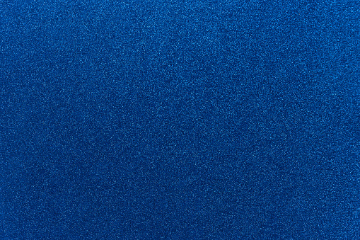 Blue colored glitter cardstock paper background