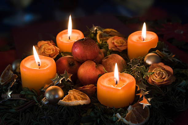 Advent wreath "Advent wreath with applesSee more images, click here:" advent candle wreath adventskranz stock pictures, royalty-free photos & images