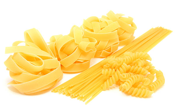 istock Variety of raw pasta on white background 182863729
