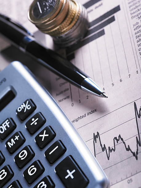 istock Financial Chart with Coins And Calculator 182864568