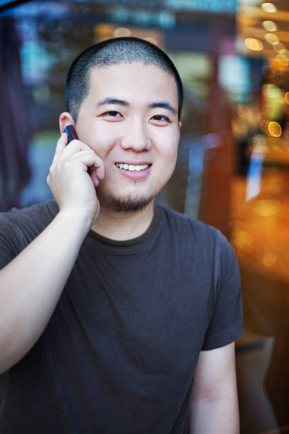istock Making a phone call outside the shop 182864845