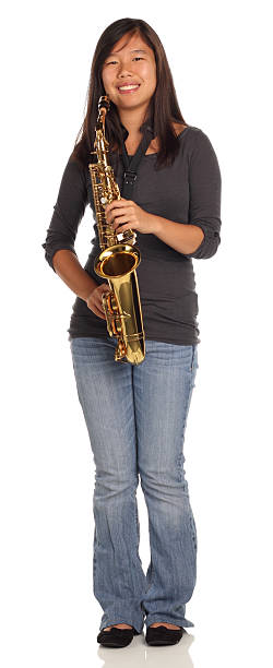 istock Smiling sax girl 182865349