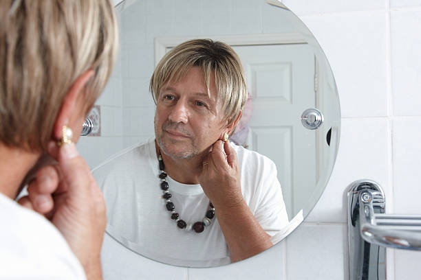 istock Cross dresser in the bathroom mirror 182865359