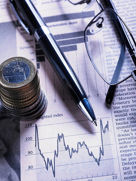 istock Financial Chart with Glasses And Coins 182865654