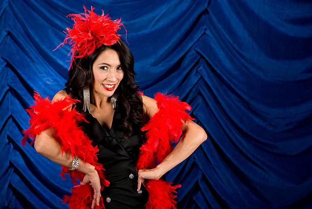 istock side show woman with red boha 182866104