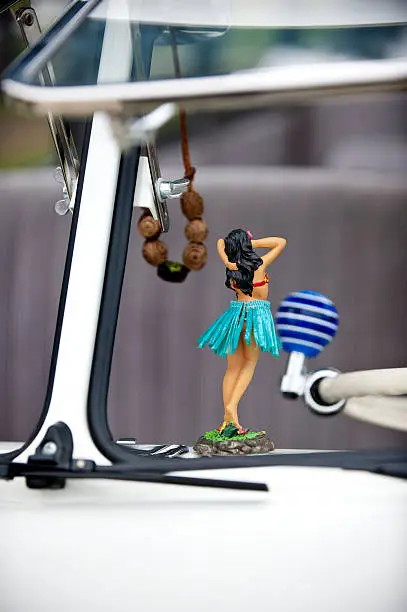 Vintage VW bus with hula girl on dashboard copy space on bottom. Surfer theme.