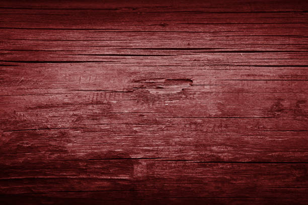 istock red textured wooden background with black 1828670471