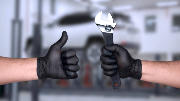 istock repair man holding tool at service 1828671546