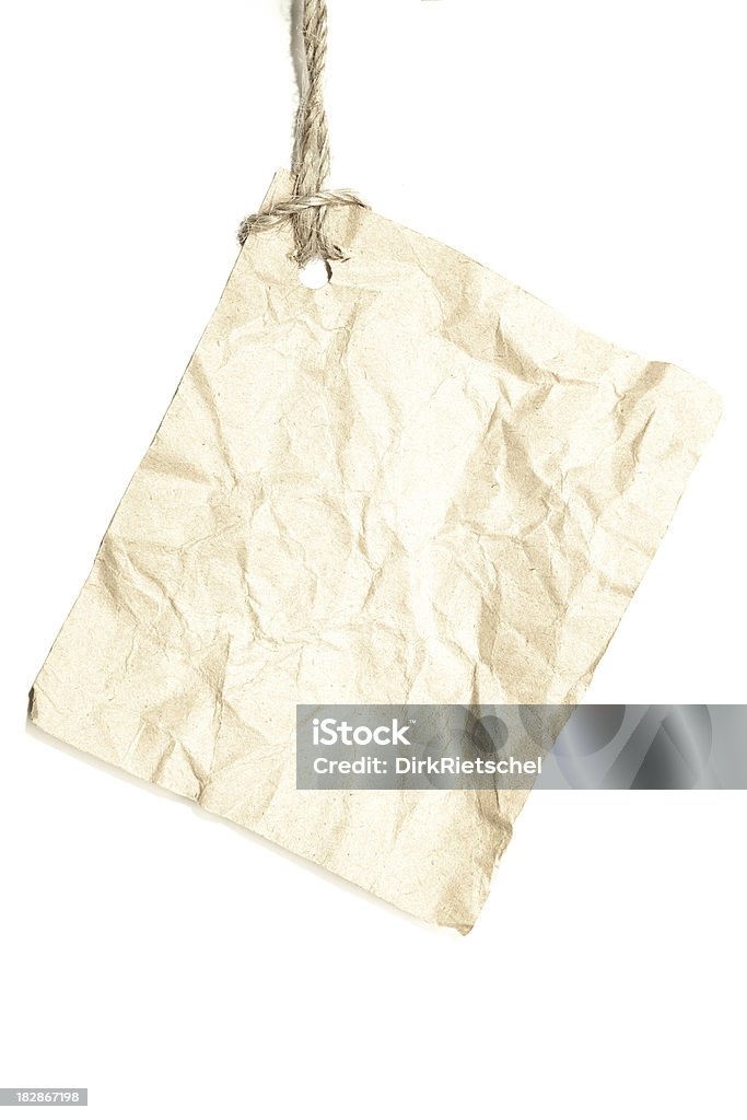 Torn piece of old paper. "Torn pieces of squared old paper, ready for your message. Isolated on white background." Adhesive Note Stock Photo