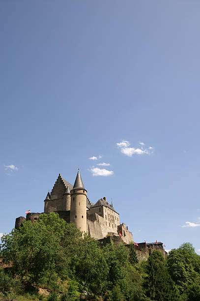 Vianden Castle Vianden castle with blue sky above. vianden stock pictures, royalty-free photos & images