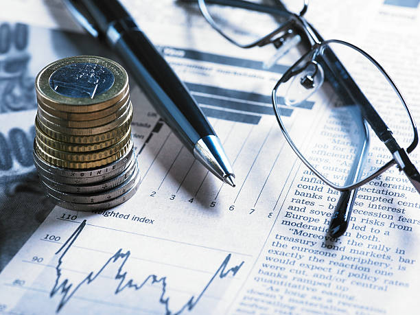 istock Financial Chart with Glasses And Coins 182867430
