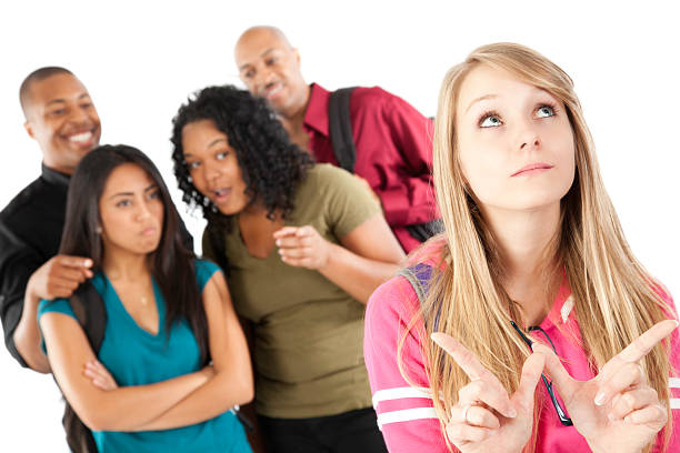 istock Group of Students Teasing Girl Who Doesn't Care 182867565