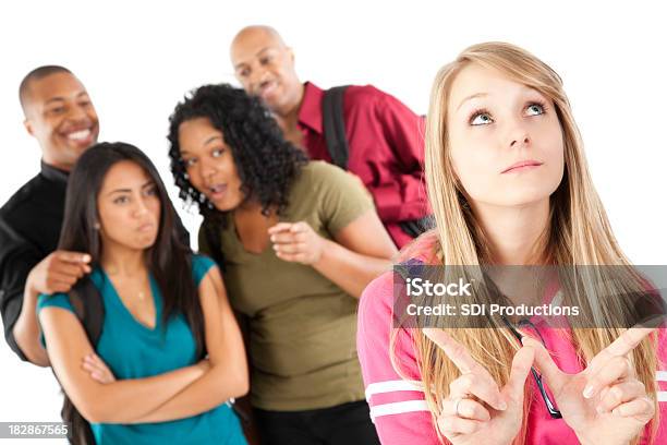 Group Of Students Teasing Girl Who Doesnt Care Stock Photo - Download Image Now - Letter W, Hand Sign, Adult