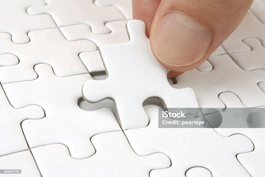 puzzle - Foto stock royalty-free di Tessera di puzzle