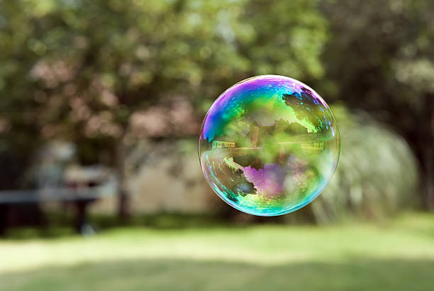 Castle reflecting in flying  a soap bubble stock photo