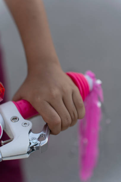 A girl riding a bicycle.