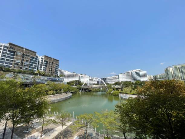 Singapore Travel Pictures Waterway Point in Singapore boasts a lively street adorned with a diverse array of shops and eateries, creating a vibrant and bustling atmosphere for locals and visitors alike. The waterfront promenade adds a picturesque touch, offering a charming setting for leisurely strolls along the scenic Punggol Waterway. gardens-by-the-bay-dome stock pictures, royalty-free photos & images