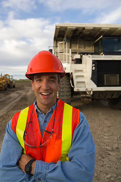 istock Construction Worker in Front of a Heavy Hauler 182869072