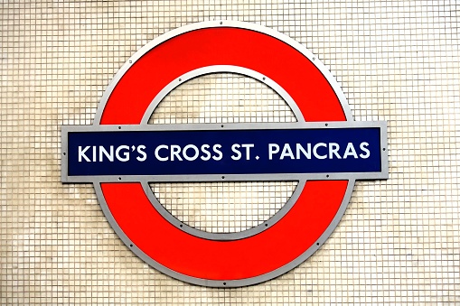 King's Cross, London, England, UK - December 2nd 2023: King's Cross St Pancras tube station roundel sign