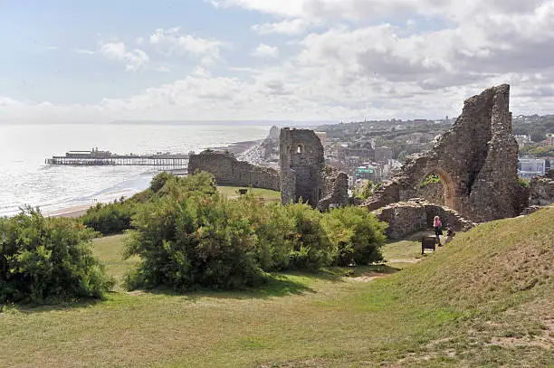 Hastings Castle ruins which date from the Norman invasion of 1066 AD - perched on the cliff above Hastings and set against the sparkling light of the English Channel