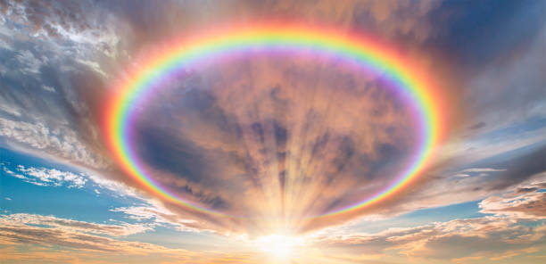 istock Calm sea before storm with amazing rainbow at sunset 1828692997