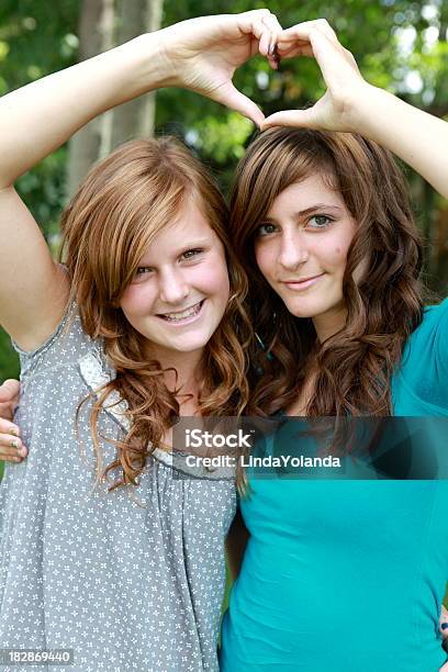 Beautiful Teen Girls Stock Photo - Download Image Now - Adolescence, Heart Shape, Love - Emotion