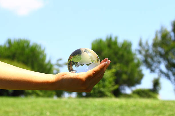 Globe in hand stock photo