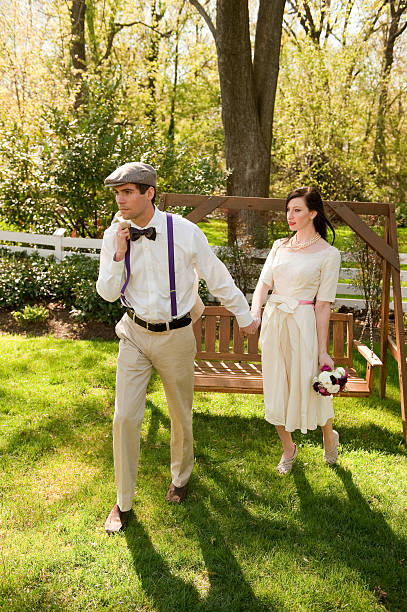 istock Vintage Bow Tie Groom with Bride in Gardens 182869804