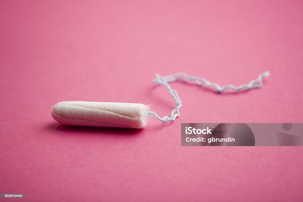 Tampon on pink background Tampon Stock Photo